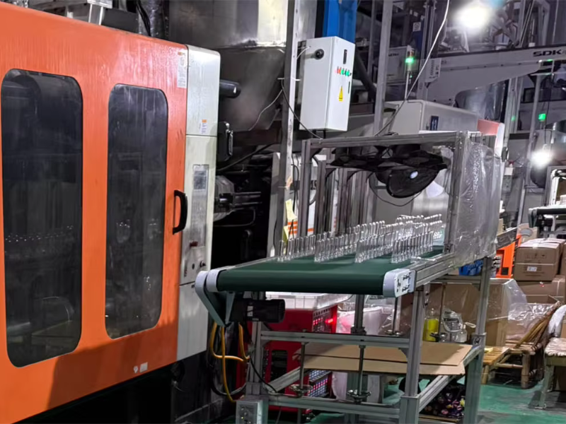 The picture shows the real-life factory of the PET preform system